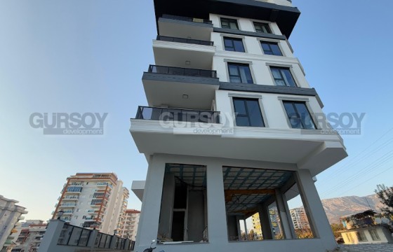 Новый жилой комплекс в районе Каргиджак в 700 метрах от моря в Турции - фото 8