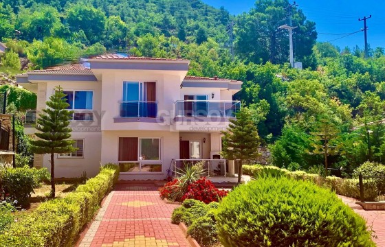 Вилла, окружённая зеленью, расположена в комплексе с развитой инфраструктурой в Турции - фото 6