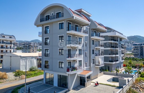 Квартира 1+1 в районе Каргыджак, всего в 300 метрах от моря в Турции - фото 2