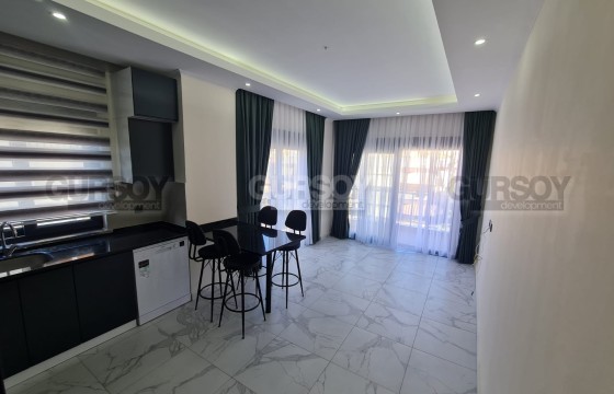 Современная квартира 1+1 в самом центре Алании в Турции - фото 1