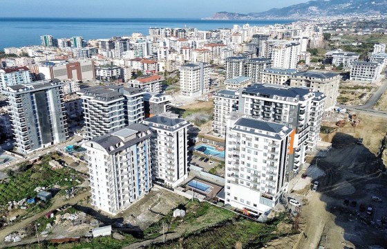 1+1 в новом жилом комплексе в районе Махмутлар в Турции - фото 12