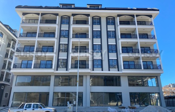 Современная квартира 1+1 в центре Махмутлара по отличной цене в Турции - фото 9