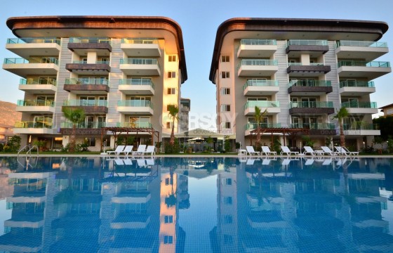 Просторная квартира 1+1 в районе Кестель рядом с морем в Турции - фото 11