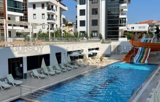 Просторная квартира 1+1 в престижном районе Оба в Турции - фото 1