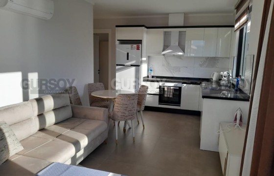 Квартира 1+1 с панорамным видом на море в Каргыджаке в Турции - фото 6