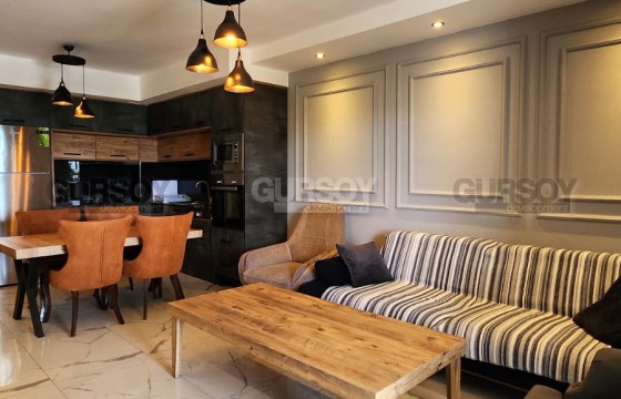 Квартира с новым ремонтом 1+1 в комплексе отельного типа в районе Джикджили в Турции - фото 4