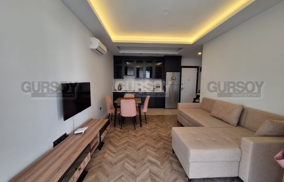 Меблированная квартира 1+1 в премиум комплексе на первой линии в центре Алании в Турции - фото 8