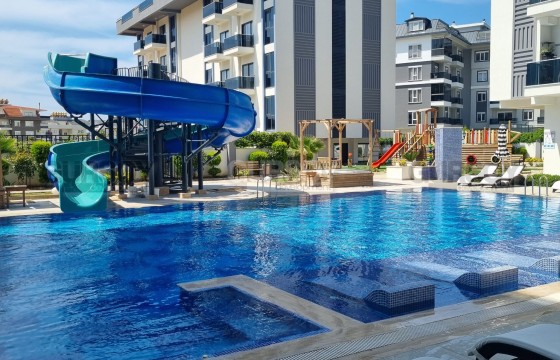 Недорогая квартира в комплексе с полной инфраструктурой в районе Оба в Турции - фото 1