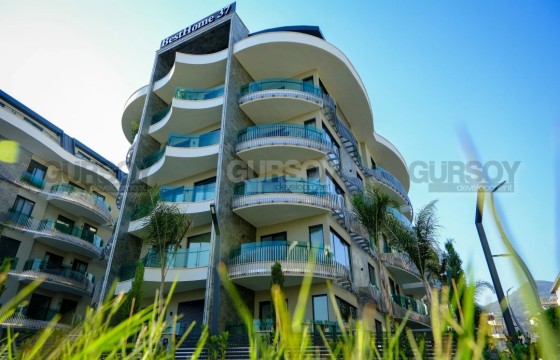 Квартира 2+1 в новом комплексе премиум класса рядом с пляжем Кейкубат в центре Алании в Турции - фото 3