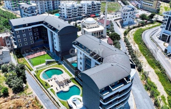 Квартира 1+1 в новом премиум комплексе в 150 метрах от пляжа в Каргыджаке в Турции - фото 3