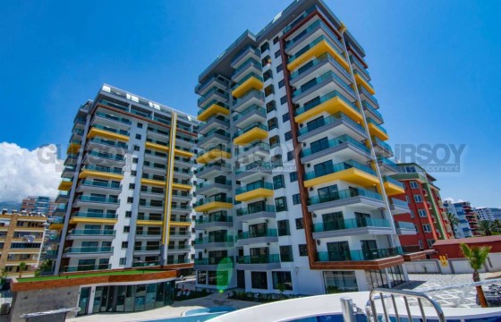 Квартира 2+1 с видом на море в комплексе на первой линии в Махмутларе в Турции - фото 10