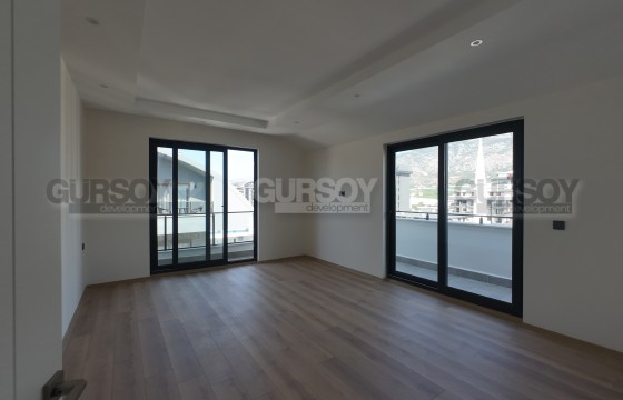 Дуплекс 3+1 в новом доме в центре района Махмутлар по супер-цене в Турции - фото 3