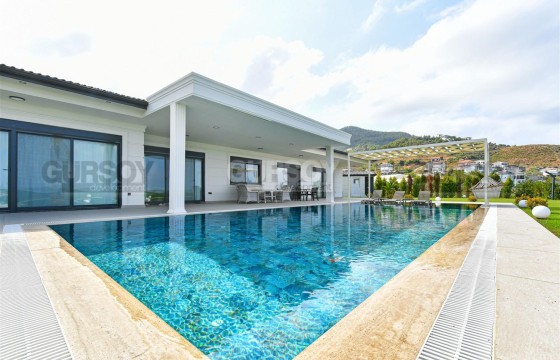 Роскошная вилла с большим участком в Газипаше в Турции - фото 9