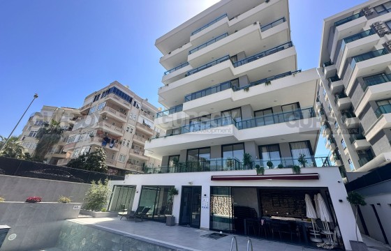 Просторная квартира 3+1 в хорошем доме у пляжа Клеопатра в Турции - фото 8