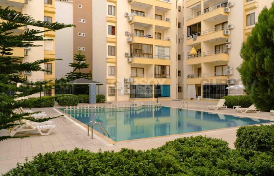 Мебелированная квартира 1+1 в комплексе с великолепной территорией в Турции - фото 1