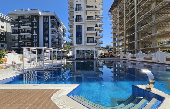 Квартира 1+1 в комплексе с инфраструктурой отеля в Турции - фото 11