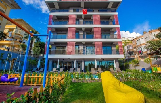 Просторная квартира 1+1 в современном жилом комплексе в Турции - фото 9