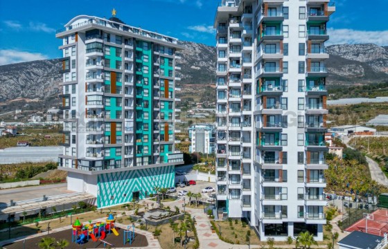 Квартира 1+1 в новом комплексе с видом на море в Турции - фото 2