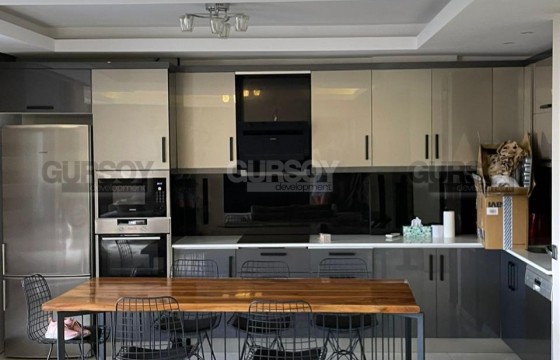 Стильная квартира 2+1 с выходом в сад в 50 метрах от пляжа в Турции - фото 5