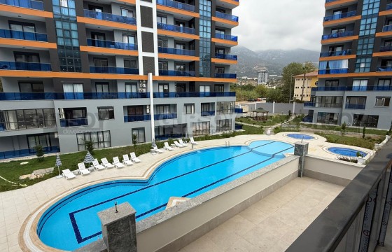 Совершенно новая квартира 1+1 в комплексе с базовой инфраструктурой в Турции - фото 12