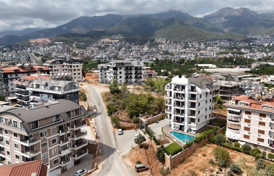 Уютная квартира 1+1 в современном комплексе с инфраструктурой в Турции - фото 1