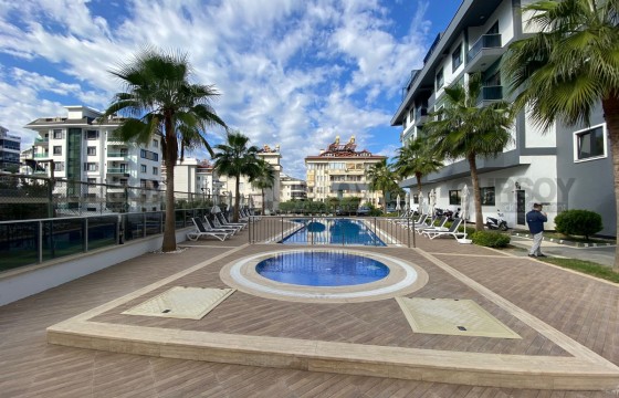 Новая двухуровневая квартира 2+1 по цене 1+1 в районе Тосмур в Турции - фото 11