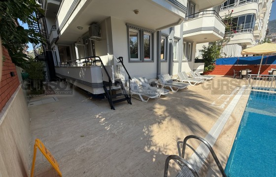 Меблированная квартира 1+1 в ухоженном доме с бассейном рядом с пляжем Клеопатра в Турции - фото 7