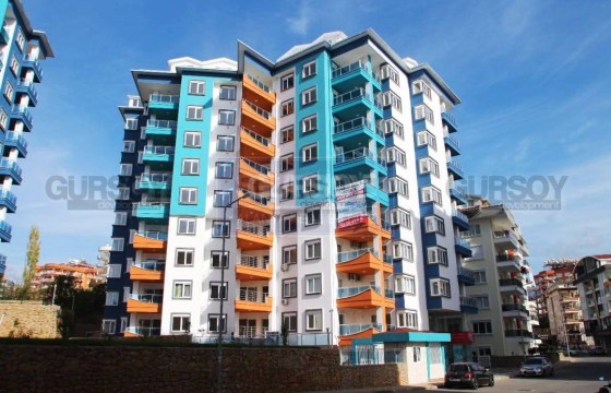 Просторная квартира 1+1 с мебелью и техникой в районе Тосмур в Турции - фото 1