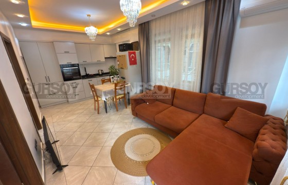 Недорогая меблированная квартира 1+1 в 100 метрах от моря в Турции - фото 1