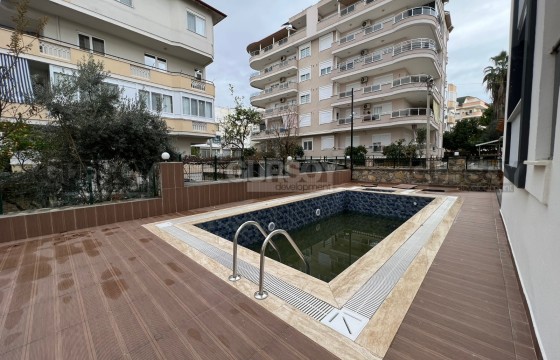 Современный меблированный дуплекс 2+1 с частичным видом на море в Турции - фото 12