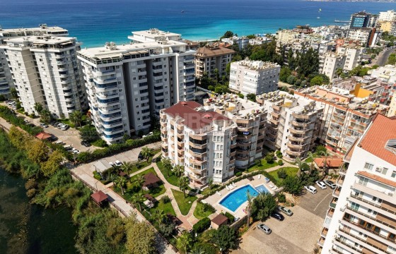 Просторная квартира 2+1 с видом на реку и частичным видом на море — 300 м до пляжа в Турции - фото 10