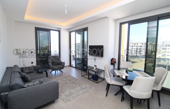 Двухкомнатная квартира в 250 метрах от моря в районе Каргыджак, 70 м2. в Турции - фото 5