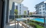 sovremennaya-kvartira-1-1-v-oba-alanya-balkon-s-vidom-na-bassein-900-m-do-morya в Турции - фото 2