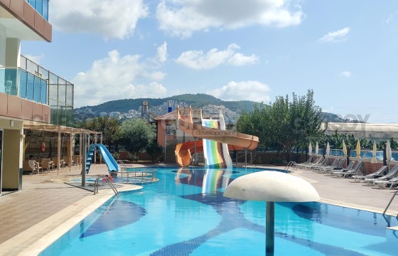 Просторная 2+1 с панорамным видом на море и горы в люкс-комплексе Махмутлара в Турции - фото 10