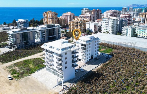 Меблированная 1+1 с видом на море в Каргыджаке в Турции - фото 10