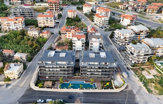 Квартира 1+1 с видом на море и крепость в районе Хасбахче в Турции - фото 1