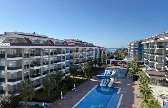 Меблированная квартира 1+1 рядом с морем в кестеле в Турции - фото 5