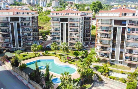 Уютная квартира 3+1 в развивающемся районе Чиплаклы, 165 м2 в Турции - фото 8