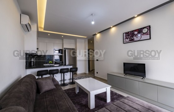 Меблированная квартира 1+1 с видом на море в районе Каргыджак, 56 м2 в Турции - фото 7