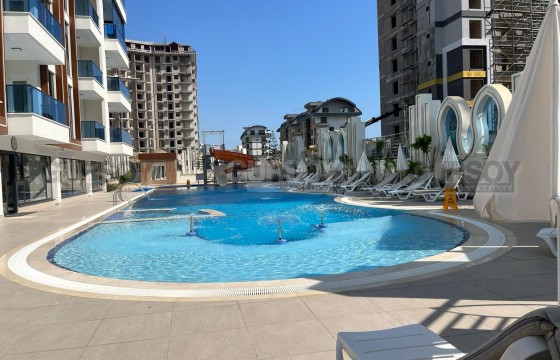 Квартира 1+1 в новом доме с инфраструктурой — Махмутлар в Турции - фото 3