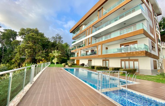 Садовый дуплекс 3+1 в районе Хасбахче с шикарным видом на море и Крепость, 160 м2 в Турции - фото 4