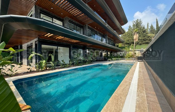 Новая квартира 2+1 с собственным садом в престижной локации в Турции - фото 10