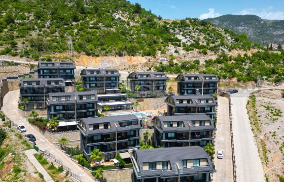 Просторная квартира 4+1 в качественном комплексе в районе Тепе в Турции - фото 9