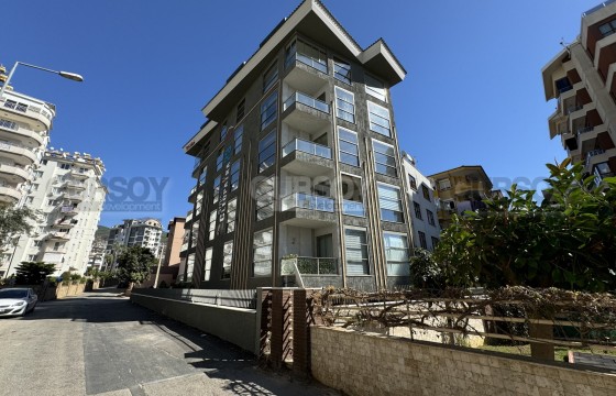 Просторный садовый дуплекс 1+1 в современном доме на Клеопатре в Турции - фото 12