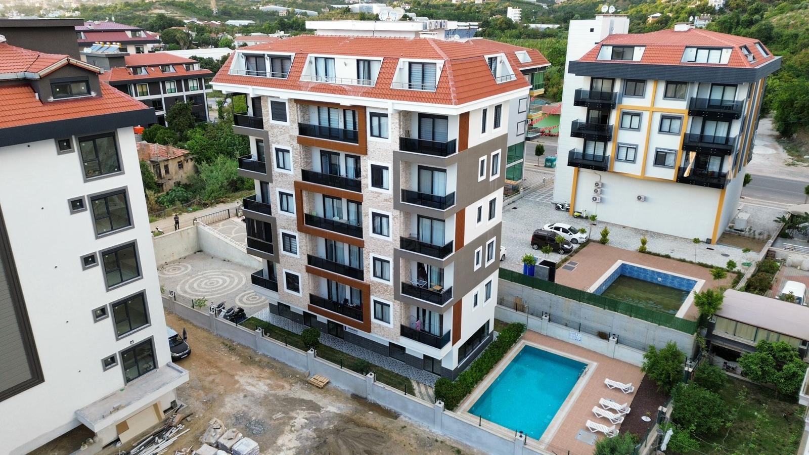 Уютная квартира 1+1 возле моря в новом комплексе в Кестелe в Турции - фото 3