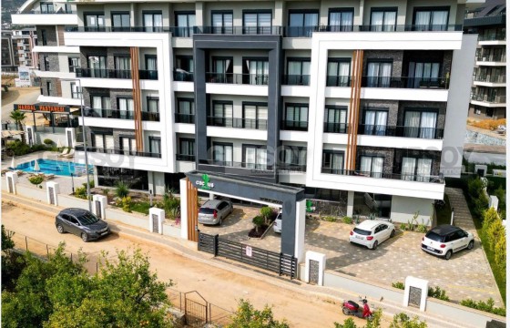 Современная квартира 1+1 в комплексе с хорошей инфраструктурой в Турции - фото 4