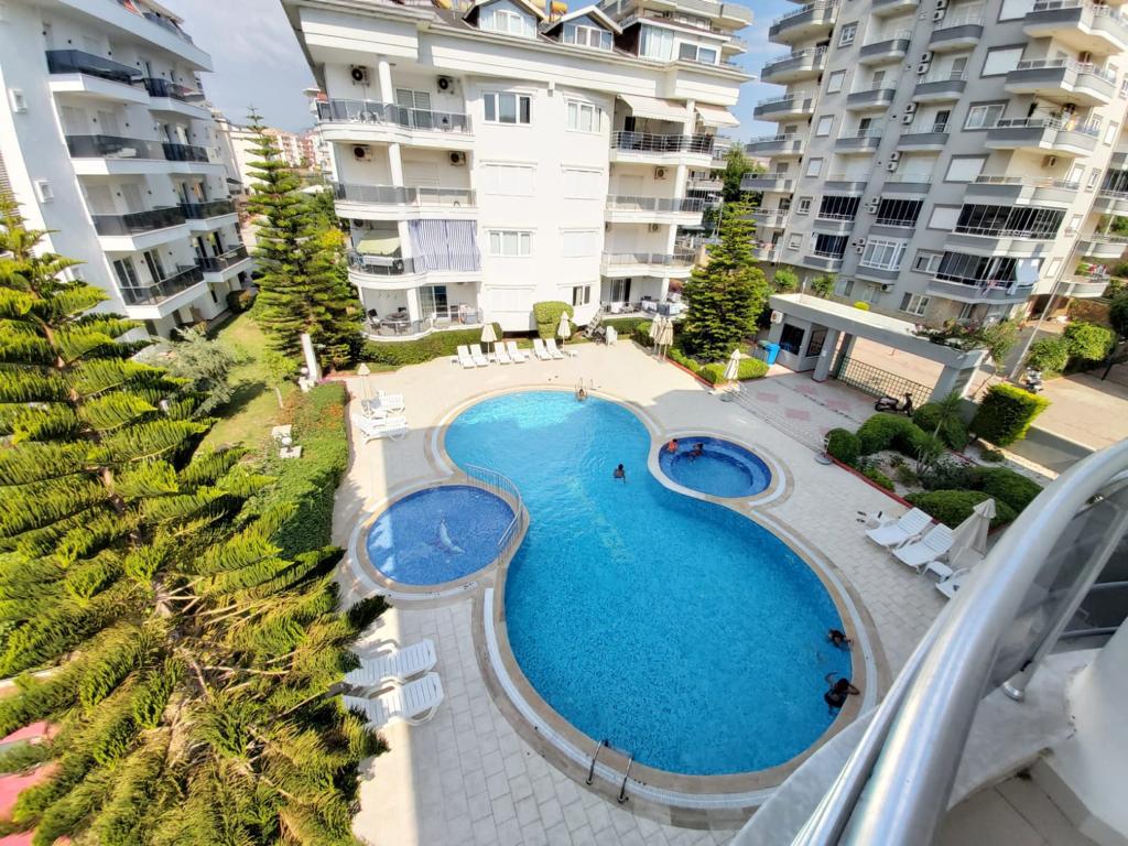 Удобная квартира 2+1 в 500 метрах от моря, район Оба в Турции - фото 1