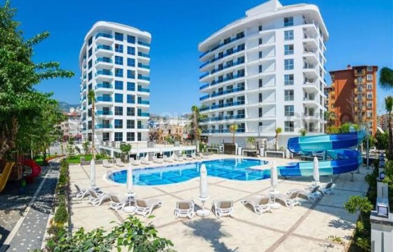 Меблированная квартира 1+1 на Клеопатре в одном из лучших комплексов в Турции - фото 1