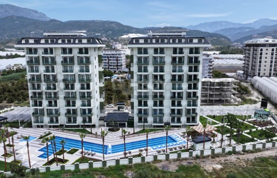 Квартира 1+1 в комплексе от элитного застройщика в Турции - фото 11