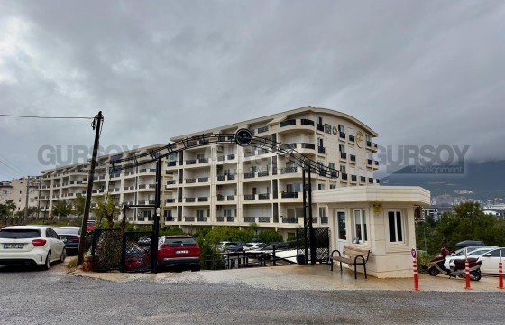 Современная квартира планировка 2+1 в районе ОБА в Турции - фото 5